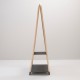 Side view of the PANÔ design rattan mirror and its shelves