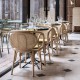Design rattan CONTOUR table armchair in a restaurant