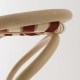 Detail of woven straps seat in Ecaille beige and Brique red of the VIRAGE design rattan barstool