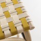 Détail de l'assise tressée et sanglée en coloris jaune Bouton d'Or et beige écaille du tabouret de bar en rotin design VIRAGE
