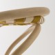Detail of the woven seat in Bouton d'Or yellow and Ecaille beige straps of the VIRAGE design rattan barstool