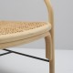 Detail of PLUS design rattan rattan armchair with IDRIS exotic fabric by Thevenon - back view