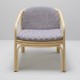 Fauteuil en rotin design HUBLOT et coussin bleu Marquetry de Sunbrella vue de face