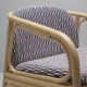 Détail du coussin du fauteuil en rotin design HUBLOT et coussin bleu Marquetry de Sunbrella